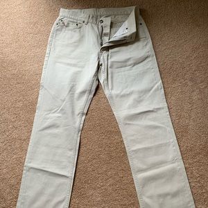 Cream color,  zip fly straight leg, jeans. Soft touch fabric